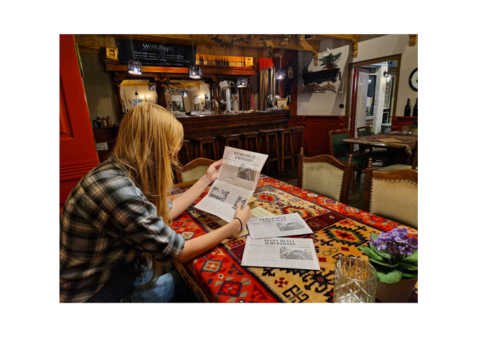 Visitors of the War Museum use the custom newspapers to solve interactive puzzles - Genscom 